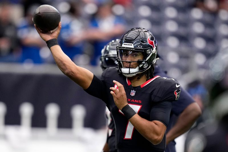 Houston Texans quarterback C.J. Stroud warms up before an NFL football game against the Indianapolis Colts, Sunday, Oct. 27, 2024, in Houston. (AP Photo/Eric Christian Smith)