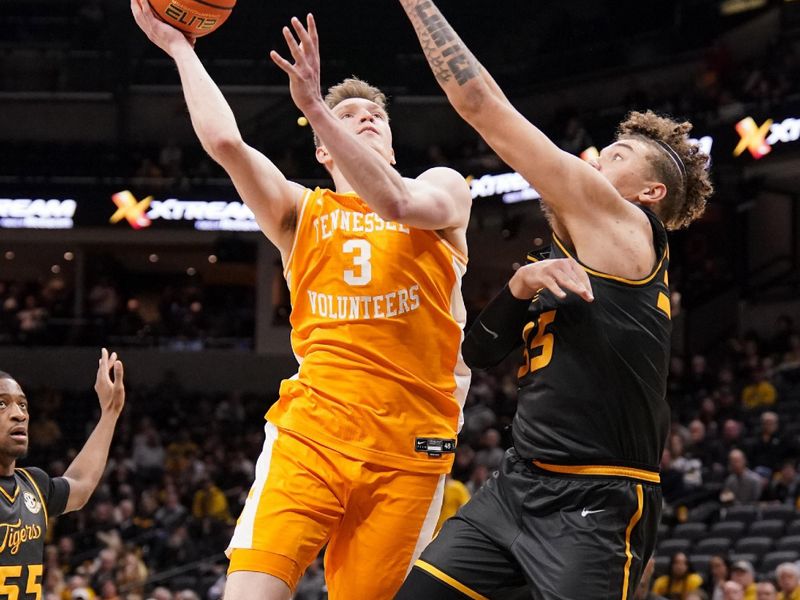 Feb 20, 2024; Columbia, Missouri, USA; Tennessee Volunteers guard Dalton Knecht (3) shoots as Missouri Tigers forward Noah Carter (35) defends during the second half at Mizzou Arena. Mandatory Credit: Denny Medley-USA TODAY Sports