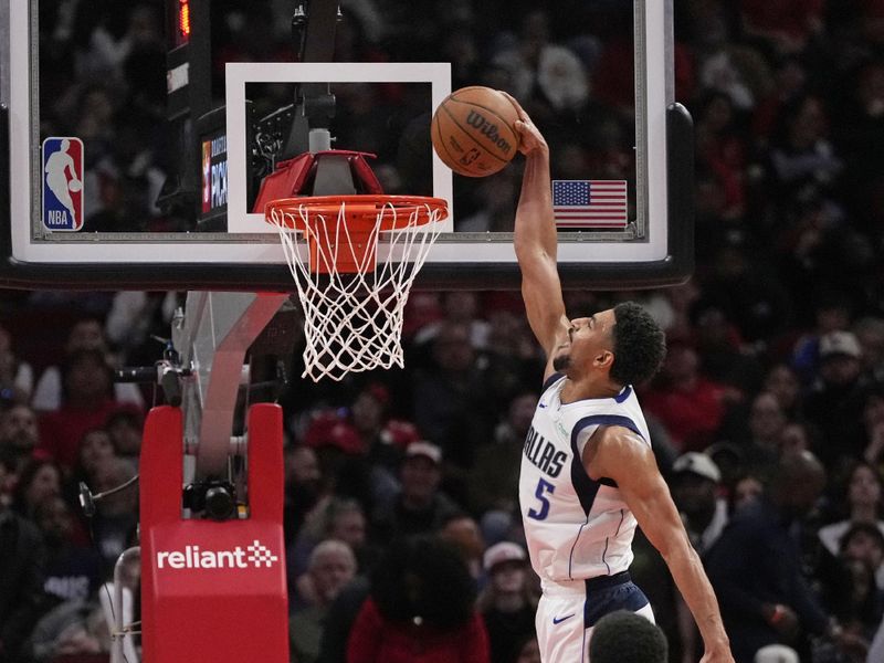 HOUSTON, TX - JANUARY 1: Quentin Grimes #5 of the Dallas Mavericks dunks the ball during the game against the Houston Rockets on January 1, 2025 at the Toyota Center in Houston, Texas. NOTE TO USER: User expressly acknowledges and agrees that, by downloading and or using this photograph, User is consenting to the terms and conditions of the Getty Images License Agreement. Mandatory Copyright Notice: Copyright 2025 NBAE (Photo by Kevin M. Cox/NBAE via Getty Images)