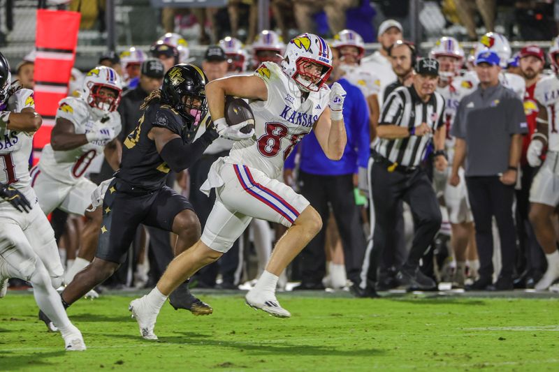 Oct 4, 2025; Orlando, Florida, USA; Kansas Jayhawks tight end Boden Groen (88) runs the ball during the second quarter against the UCF Knights at FBC Mortgage Stadium. Mandatory Credit: Mike Watters-Imagn Images