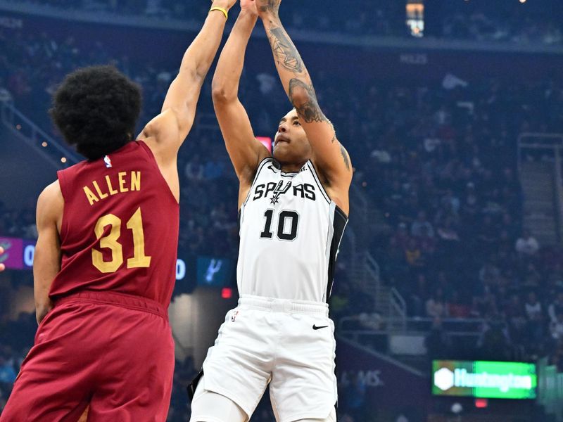 CLEVELAND, OHIO - FEBRUARY 13: Jeremy Sochan #10 of the San Antonio Spurs shoots over Jarrett Allen #31 of the Cleveland Cavaliers during the first quarter at Rocket Mortgage Fieldhouse on February 13, 2023 in Cleveland, Ohio. NOTE TO USER: User expressly acknowledges and agrees that, by downloading and or using this photograph, User is consenting to the terms and conditions of the Getty Images License Agreement. (Photo by Jason Miller/Getty Images)