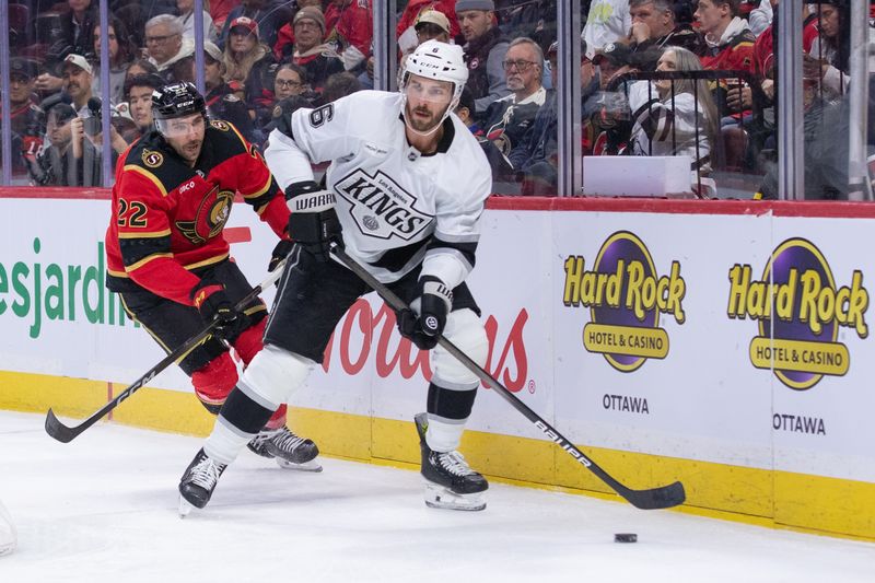 Nov 15, 2025; Ottawa, Ontario, CAN; Los Angeles Kings defenseman Joel Edmunson (6) skates with the puck in front of Ottawa Senators right wing Michael Amadio (22) in the first period at the Canadian Tire Centre. Mandatory Credit: Marc DesRosiers-IMAGN Images