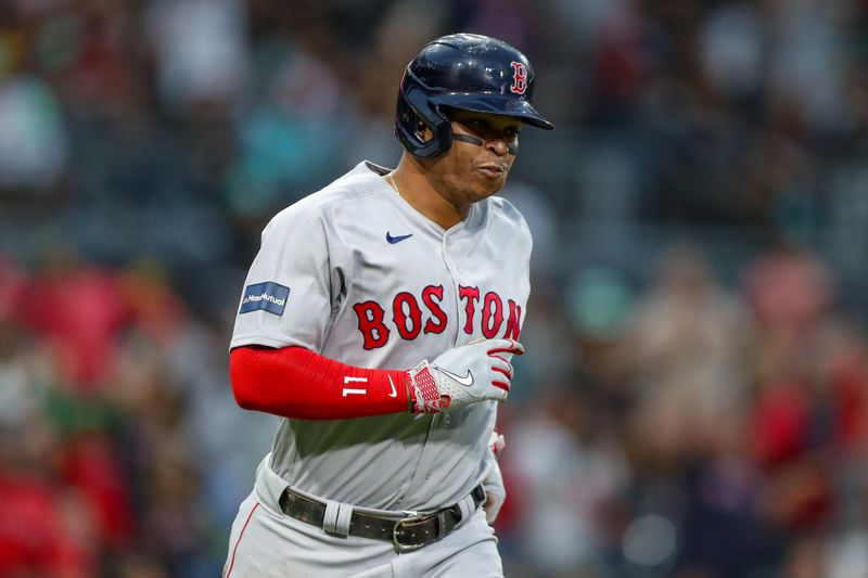 May 19, 2023; San Diego, California, USA;  Boston Red Sox third baseman Rafael Devers (11) rounds the bases after hitting his second home run of the game in the third inning against the San Diego Padres at Petco Park. at Petco Park. Mandatory Credit: David Frerker-USA TODAY Sports