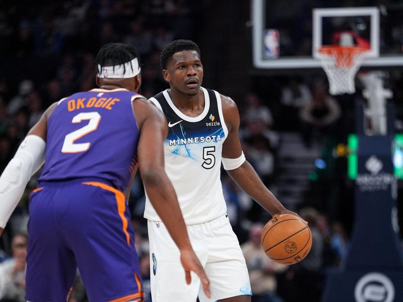 MINNEAPOLIS, MN -  NOVEMBER 17: Anthony Edwards #5 of the Minnesota Timberwolves dribbles the ball during the game against the Phoenix Suns on November 17, 2024 at Target Center in Minneapolis, Minnesota. NOTE TO USER: User expressly acknowledges and agrees that, by downloading and or using this Photograph, user is consenting to the terms and conditions of the Getty Images License Agreement. Mandatory Copyright Notice: Copyright 2024 NBAE (Photo by Jordan Johnson/NBAE via Getty Images)