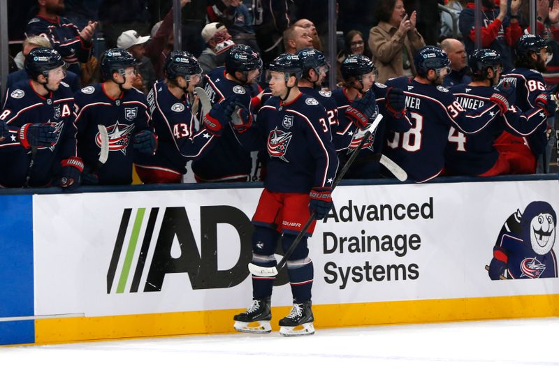 Jan 13, 2026; Columbus, Ohio, USA; Columbus Blue Jackets center Charlie Coyle (3) celebrates his goal against the Calgary Flames during the first period at Nationwide Arena. Mandatory Credit: Russell LaBounty-Imagn Images