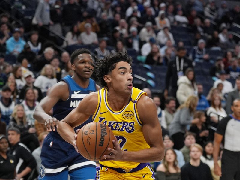 MINNEAPOLIS, MN -  DECEMBER 13: Max Christie #12 of the Los Angeles Lakers looks to pass the ball during the game against the Minnesota Timberwolves on December 13, 2024 at Target Center in Minneapolis, Minnesota. NOTE TO USER: User expressly acknowledges and agrees that, by downloading and or using this Photograph, user is consenting to the terms and conditions of the Getty Images License Agreement. Mandatory Copyright Notice: Copyright 2024 NBAE (Photo by Jordan Johnson/NBAE via Getty Images)