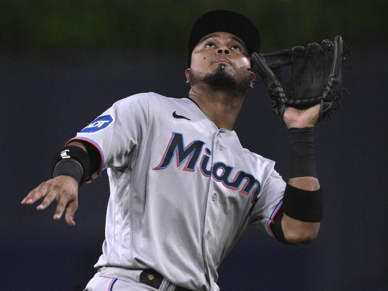 Aug 22, 2023; San Diego, California, USA; Miami Marlins second baseman Luis Arraez (3) catches a pop-up hit by San Diego Padres third baseman Ha-seong Kim (not pictured) during the fourth inning at Petco Park. Mandatory Credit: Orlando Ramirez-USA TODAY Sports