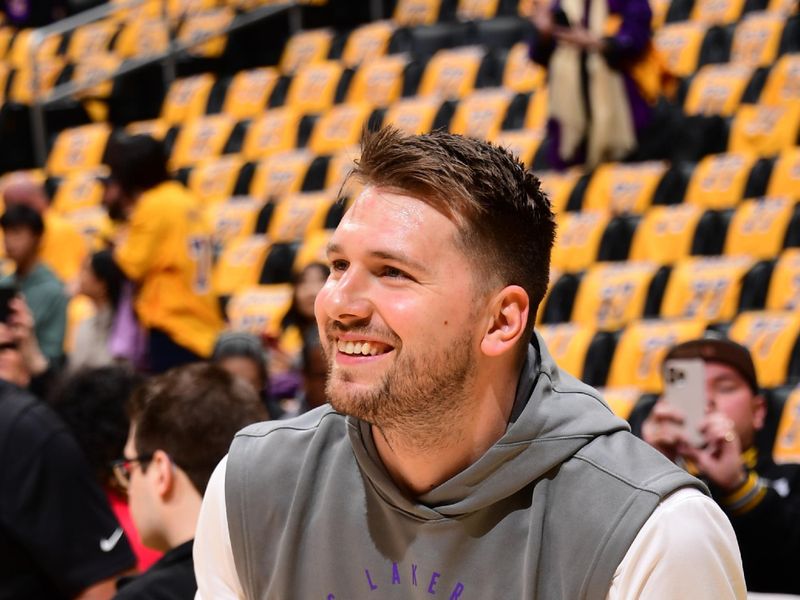 LOS ANGELES, CA - FEBRUARY 10:  Luka Doncic #77 of the Los Angeles Lakers warms up before the game against the Utah Jazz on February 10, 2025 at Crypto.Com Arena in Los Angeles, California. NOTE TO USER: User expressly acknowledges and agrees that, by downloading and/or using this Photograph, user is consenting to the terms and conditions of the Getty Images License Agreement. Mandatory Copyright Notice: Copyright 2025 NBAE (Photo by Adam Pantozzi/NBAE via Getty Images)