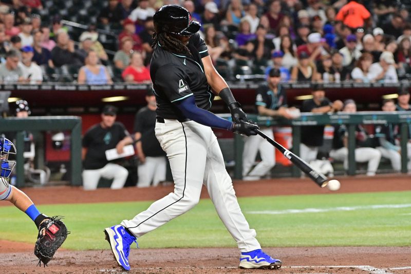 Aug 29, 2024; Phoenix, Arizona, USA;  Arizona Diamondbacks first base Josh Bell (36) singles in the second inning against the New York Mets at Chase Field. Mandatory Credit: Matt Kartozian-USA TODAY Sports