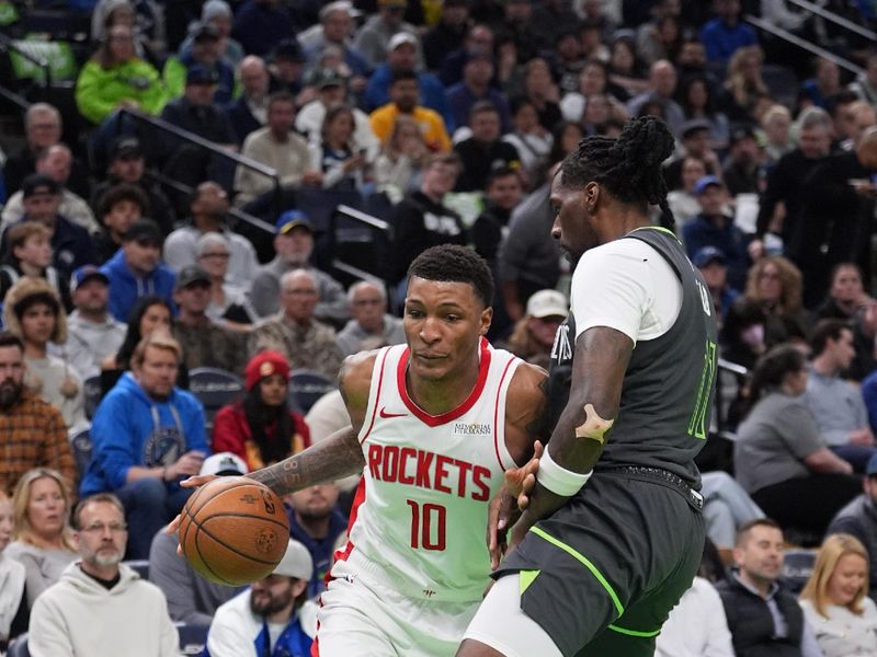 MINNEAPOLIS, MN -  NOVEMBER 26: Jabari Smith Jr. #10 of the Houston Rockets drives to the basket during the game against the Minnesota Timberwolves during the Emirates NBA Cup game on November 26, 2024 at Target Center in Minneapolis, Minnesota. NOTE TO USER: User expressly acknowledges and agrees that, by downloading and or using this Photograph, user is consenting to the terms and conditions of the Getty Images License Agreement. Mandatory Copyright Notice: Copyright 2024 NBAE (Photo by Jordan Johnson/NBAE via Getty Images)