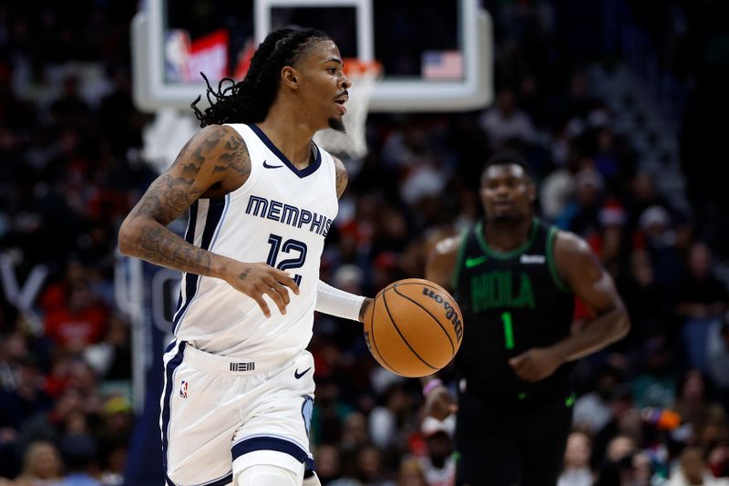 NEW ORLEANS, LOUISIANA - DECEMBER 19: Ja Morant #12 of the Memphis Grizzlies drives the ball up the court against the New Orleans Pelicans at Smoothie King Center on December 19, 2023 in New Orleans, Louisiana.  NOTE TO USER: User expressly acknowledges and agrees that, by downloading and or using this photograph, User is consenting to the terms and conditions of the Getty Images License Agreement. (Photo by Chris Graythen/Getty Images)