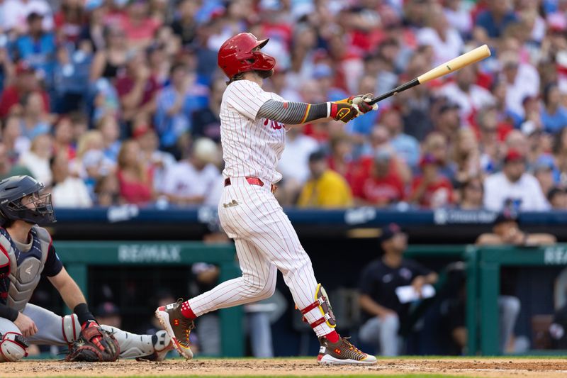 Jul 27, 2024; Philadelphia, Pennsylvania, USA;  Philadelphia Phillies first base Bryce Harper (3) hits a two RBI home run during the fourth inning against the Cleveland Guardians at Citizens Bank Park. Mandatory Credit: Bill Streicher-USA TODAY Sports