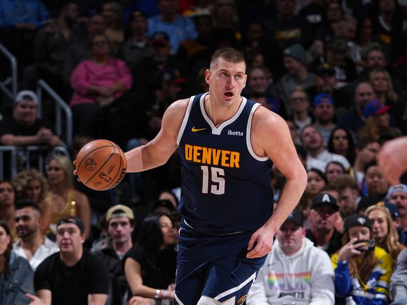 DENVER, CO - FEBRUARY 14: Nikola Jokic #15 of the Denver Nuggets dribbles the ball during the game against the Sacramento Kings on February 14, 2024 at the Ball Arena in Denver, Colorado. NOTE TO USER: User expressly acknowledges and agrees that, by downloading and/or using this Photograph, user is consenting to the terms and conditions of the Getty Images License Agreement. Mandatory Copyright Notice: Copyright 2024 NBAE (Photo by Garrett Ellwood/NBAE via Getty Images)