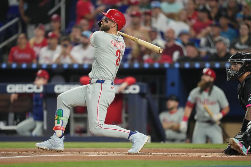 Sep 6, 2025; Miami, Florida, USA;  Philadelphia Phillies first baseman Bryce Harper (3) hits a two-run home run in the first inning against the Miami Marlins at loanDepot Park. Mandatory Credit: Jim Rassol-Imagn Images