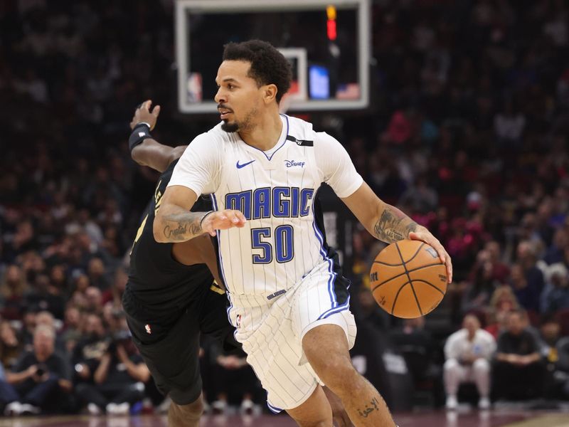 CLEVELAND, OH - NOVEMBER 1: Cole Anthony #50 of the Orlando Magic dribbles the ball during the game against the Cleveland Cavaliers on November 1, 2024 at Rocket Mortgage FieldHouse in Cleveland, Ohio. NOTE TO USER: User expressly acknowledges and agrees that, by downloading and/or using this Photograph, user is consenting to the terms and conditions of the Getty Images License Agreement. Mandatory Copyright Notice: Copyright 2024 NBAE (Photo by  Lauren Leigh Bacho/NBAE via Getty Images)