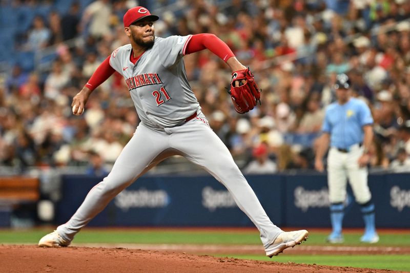 Jul 28, 2024; St. Petersburg, Florida, USA; Cincinnati Reds starting pitcher Hunter Greene (21) throws a pitch in the second inning against the Tampa Bay Rays at Tropicana Field. Mandatory Credit: Jonathan Dyer-USA TODAY Sports