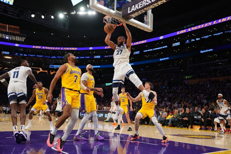 LOS ANGELES, CA - OCTOBER 22: Rudy Gobert #27 of the Minnesota Timberwolves dunks the ball during the game against the Los Angeles Lakers on October 22, 2024 at Crypto.Com Arena in Los Angeles, California. NOTE TO USER: User expressly acknowledges and agrees that, by downloading and/or using this Photograph, user is consenting to the terms and conditions of the Getty Images License Agreement. Mandatory Copyright Notice: Copyright 2024 NBAE (Photo by Garrett Ellwood/NBAE via Getty Images)