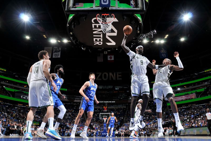 ORLANDO, FL - APRIL 14: Bobby Portis #9 of the Milwaukee Bucks handles the ball during the game against the Orlando Magic on April 14, 2024 at Kia Center in Orlando, Florida. NOTE TO USER: User expressly acknowledges and agrees that, by downloading and or using this photograph, User is consenting to the terms and conditions of the Getty Images License Agreement. Mandatory Copyright Notice: Copyright 2024 NBAE (Photo by Fernando Medina/NBAE via Getty Images)