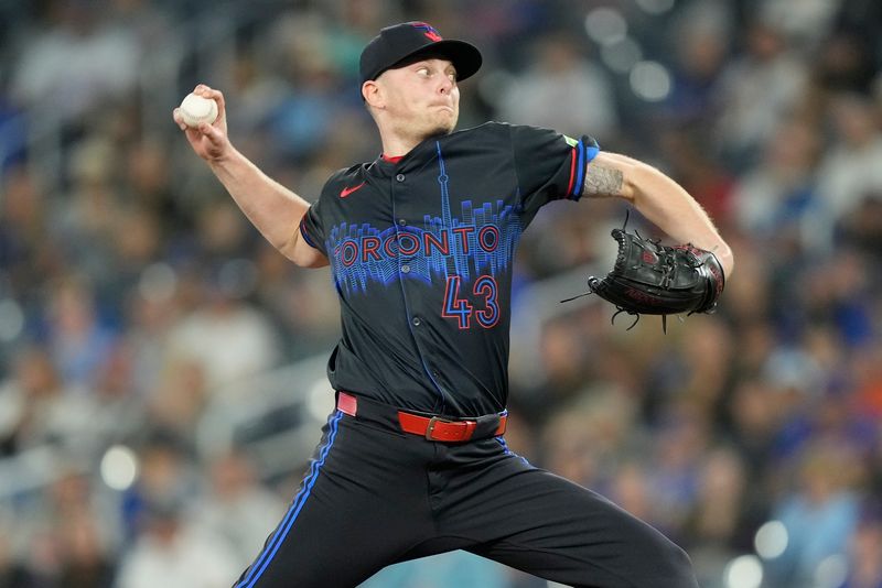 Sep 9, 2024; Toronto, Ontario, CAN; Toronto Blue Jays starting pitcher Ryan Burr (43) pitches to the New York Mets during the first inning at Rogers Centre. Mandatory Credit: John E. Sokolowski-Imagn Images