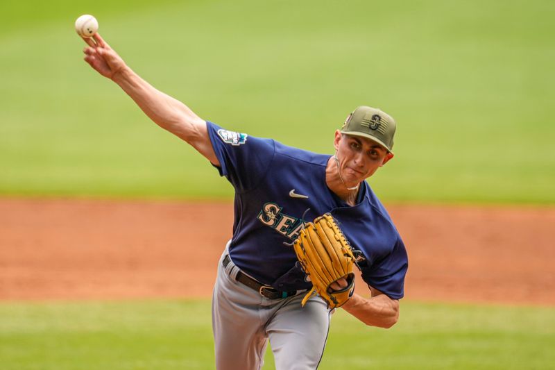 May 21, 2023; Cumberland, Georgia, USA; Seattle Mariners starting pitcher George Kirby (68) pitches against the Atlanta Braves during the first inning at Truist Park. Mandatory Credit: Dale Zanine-USA TODAY Sports