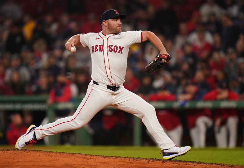 Apr 22, 2025; Boston, Massachusetts, USA; Boston Red Sox pitcher Liam Hendriks (31) throws a pitch against the Seattle Mariners in the ninth inning at Fenway Park. Mandatory Credit: David Butler II-Imagn Images