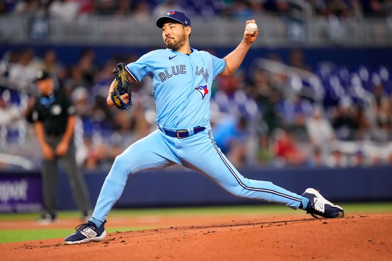 Jun 20, 2023; Miami, Florida, USA; Toronto Blue Jays starting pitcher Yusei Kikuchi (16) throws a pitch against the Miami Marlins during the first inning at loanDepot Park. Mandatory Credit: Rich Storry-USA TODAY Sports