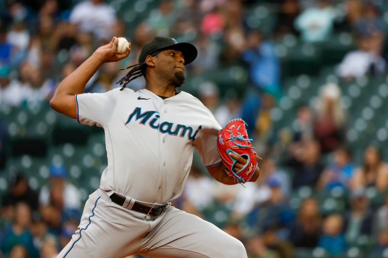 Jun 13, 2023; Seattle, Washington, USA; Miami Marlins starting pitcher Edward Cabrera (27) throws against the Seattle Mariners during the first inning at T-Mobile Park. Mandatory Credit: Joe Nicholson-USA TODAY Sports