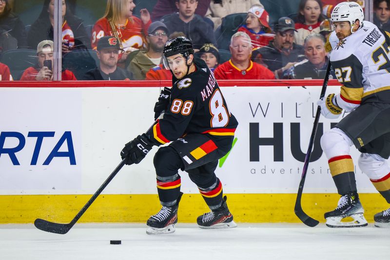 Mar 14, 2024; Calgary, Alberta, CAN; Calgary Flames left wing Andrew Mangiapane (88) controls the puck against the Vegas Golden Knights during the first period at Scotiabank Saddledome. Mandatory Credit: Sergei Belski-USA TODAY Sports