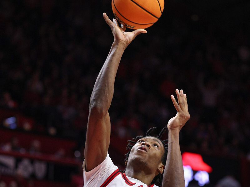 Jan 13, 2025; Piscataway, New Jersey, USA; Rutgers Scarlet Knights forward Dylan Grant (9) goes to the basket  during the second half against the UCLA Bruins at Jersey Mike's Arena. Mandatory Credit: Vincent Carchietta-Imagn Images