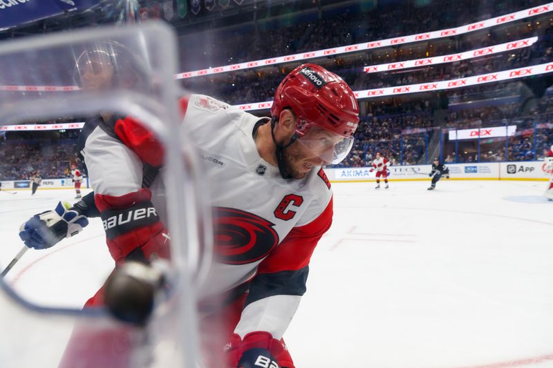 Mar 14, 2026; Tampa, Florida, USA; Carolina Hurricanes forward Jordan Staal (11) reacts to getting hit against the Tampa Bay Lightning in the third period at Benchmark International Arena. Mandatory Credit: Morgan Tencza-Imagn Images Mar 14, 2026; Tampa, Florida, USA; Carolina Hurricanes forward Jordan Staal (11) reacts to getting hit against the Tampa Bay Lightning in the third period at Benchmark International Arena. Mandatory Credit: Morgan Tencza-Imagn Images