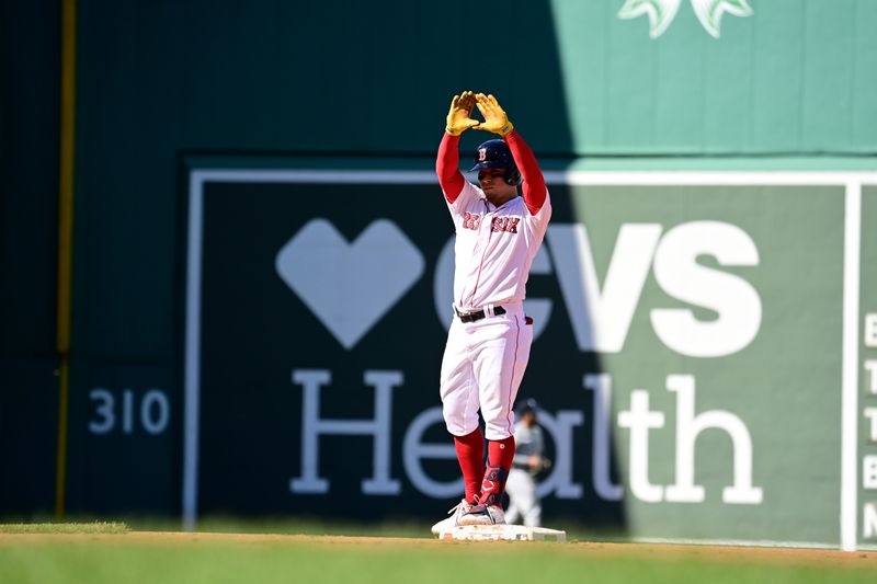 Sep 14, 2023; Boston, Massachusetts, USA; Boston Red Sox second baseman Luis Urias (17) reacts to hitting a double against the New York Yankees during the fourth inning at Fenway Park. Mandatory Credit: Eric Canha-USA TODAY Sports