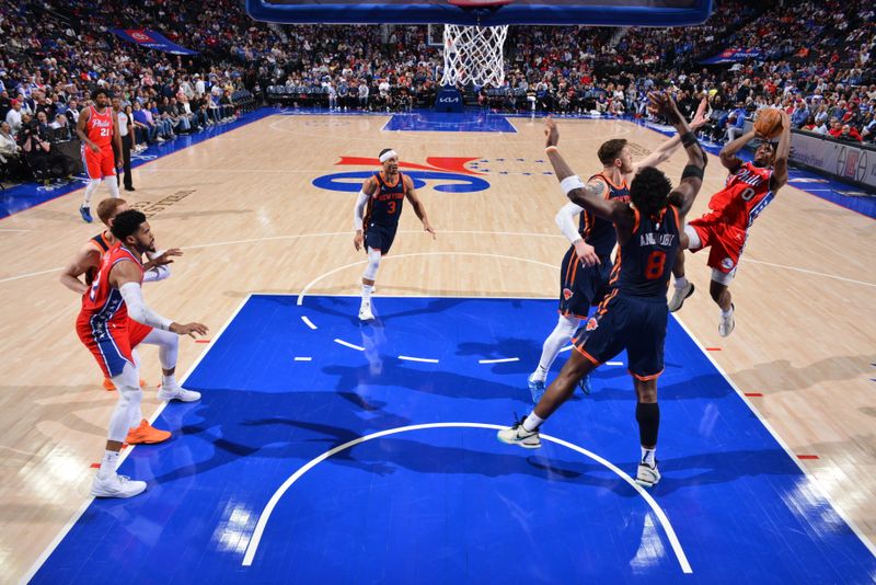 PHILADELPHIA, PA - APRIL 28: Tyrese Maxey #0 of the Philadelphia 76ers shoots the ball during the game against the New York Knicks during Round 1 Game 4 of the 2024 NBA Playoffs on April 28, 2024 at the Wells Fargo Center in Philadelphia, Pennsylvania NOTE TO USER: User expressly acknowledges and agrees that, by downloading and/or using this Photograph, user is consenting to the terms and conditions of the Getty Images License Agreement. Mandatory Copyright Notice: Copyright 2024 NBAE (Photo by Jesse D. Garrabrant/NBAE via Getty Images)