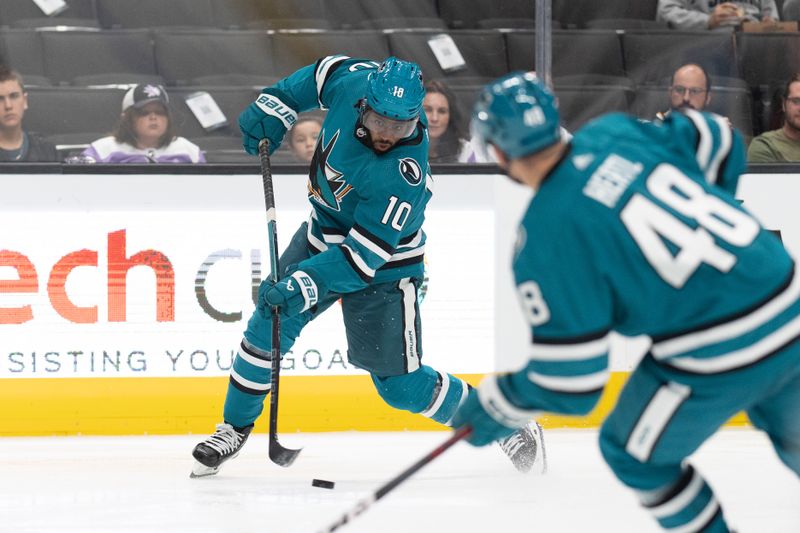 Sep 24, 2023; San Jose, California, USA;  San Jose Sharks  left wing Anthony Duclair (10) shoots the puck during the second period against the Vegas Golden Knights at SAP Center at San Jose. Mandatory Credit: Stan Szeto-USA TODAY Sports