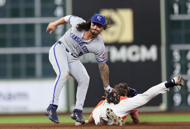 May 13, 2025; Houston, Texas, USA; Houston Astros center fielder Jake Meyers (6) is tagged out by Kansas City Royals second baseman Jonathan India (6) while trying to steal second base in the fourth inning at Daikin Park. Mandatory Credit: Thomas Shea-Imagn Images