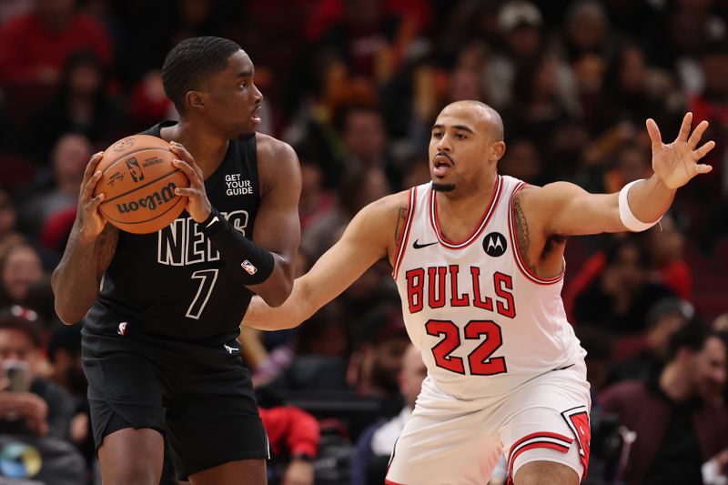 CHICAGO, ILLINOIS - DECEMBER 02: Shake Milton #7 of the Brooklyn Nets is defended by Talen Horton-Tucker #22 of the Chicago Bulls during the second half at the United Center on December 02, 2024 in Chicago, Illinois. NOTE TO USER: User expressly acknowledges and agrees that, by downloading and or using this photograph, User is consenting to the terms and conditions of the Getty Images License Agreement.  (Photo by Michael Reaves/Getty Images)