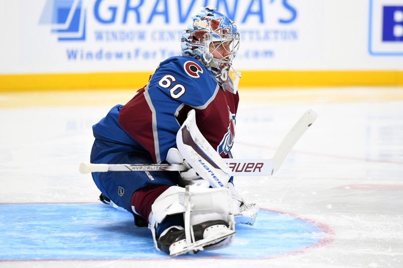 Sep 29, 2024; Denver, Colorado, USA; Colorado Avalanche goaltender Justus Annunen (60) stretches before the game against the Utah Hockey Club at Ball Arena. Mandatory Credit: Christopher Hanewinckel-Imagn Images