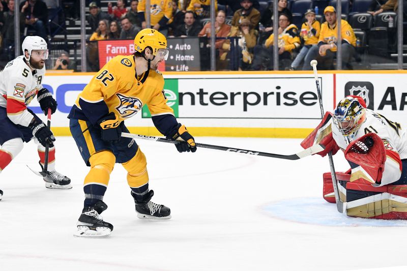 Jan 22, 2024; Nashville, Tennessee, USA; Nashville Predators center Tommy Novak (82) has a shot blocked by Florida Panthers goaltender Anthony Stolarz (41) during the third period at Bridgestone Arena. Mandatory Credit: Christopher Hanewinckel-USA TODAY Sports