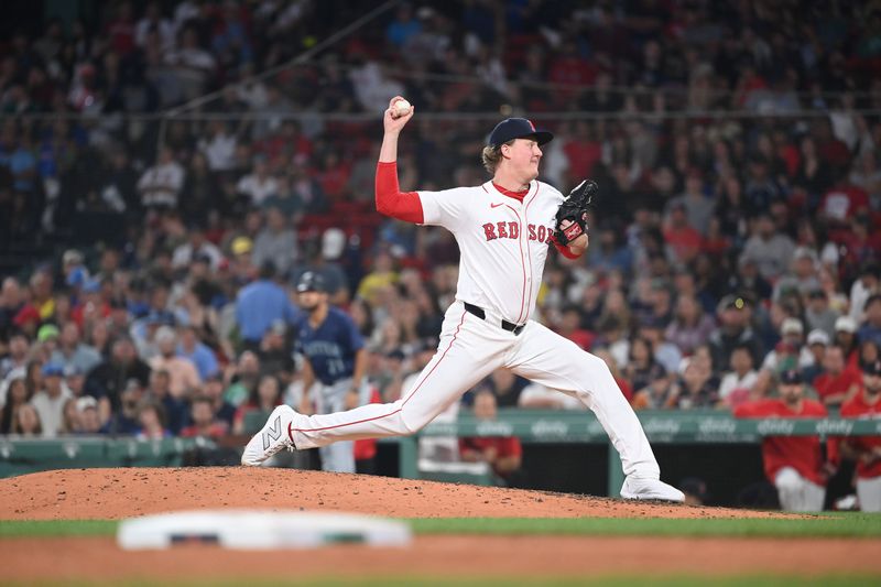 Jul 29, 2024; Boston, Massachusetts, USA; Boston Red Sox relief pitcher Trey Wingenter (61) pitches against the Seattle Mariners during the seventh inning at Fenway Park. Mandatory Credit: Eric Canha-USA TODAY Sports