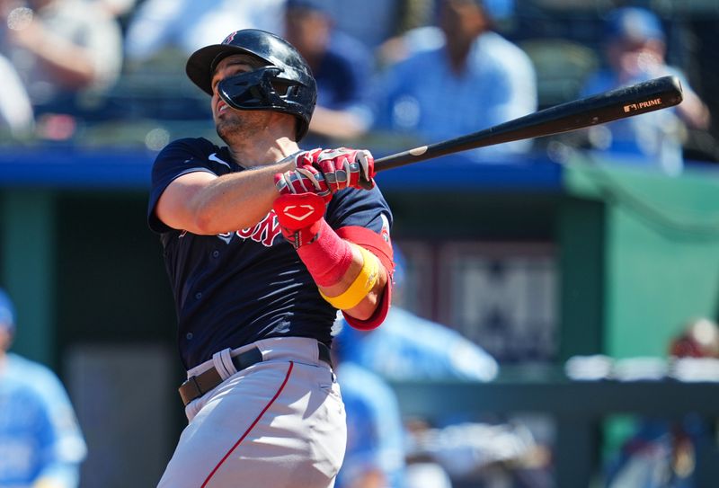 Sep 3, 2023; Kansas City, Missouri, USA; Boston Red Sox center fielder Adam Duvall (18) hits a home run during the sixth inning against the Kansas City Royals at Kauffman Stadium. Mandatory Credit: Jay Biggerstaff-USA TODAY Sports