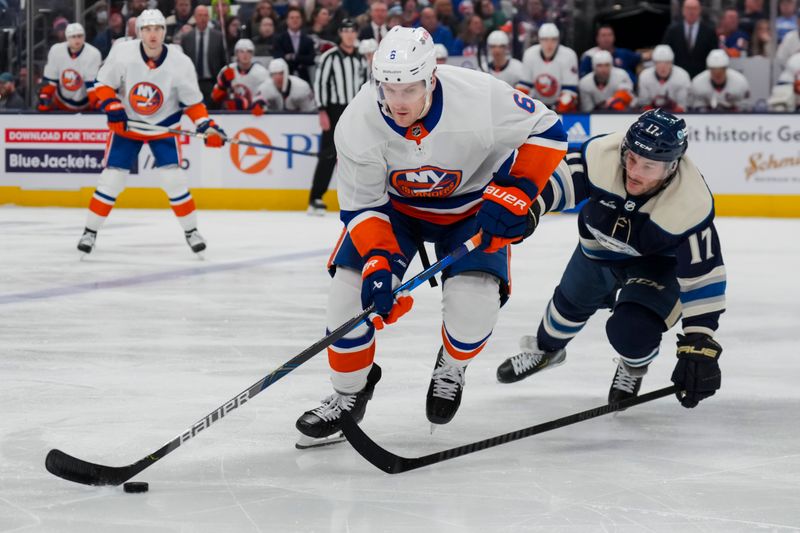 Apr 4, 2024; Columbus, Ohio, USA;  New York Islanders defenseman Ryan Pulock (6) skates with the puck against Columbus Blue Jackets right wing Justin Danforth (17) in the second period at Nationwide Arena. Mandatory Credit: Aaron Doster-USA TODAY Sports