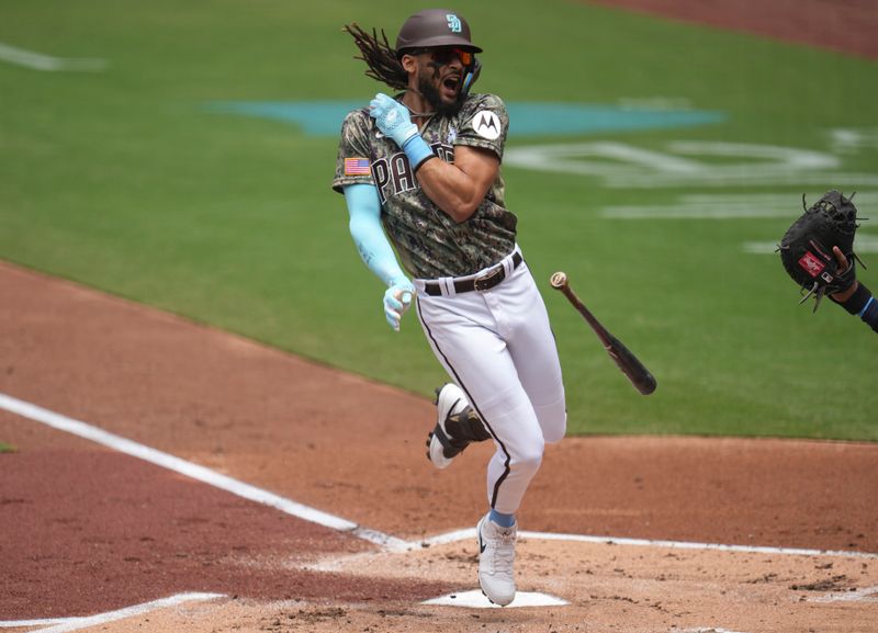 Jun 18, 2023; San Diego, California, USA;  San Diego Padres right fielder Fernando Tatis Jr. (23) reacts to being hit by a pitch during the first inning against the Tampa Bay Rays at Petco Park. Mandatory Credit: Ray Acevedo-USA TODAY Sports