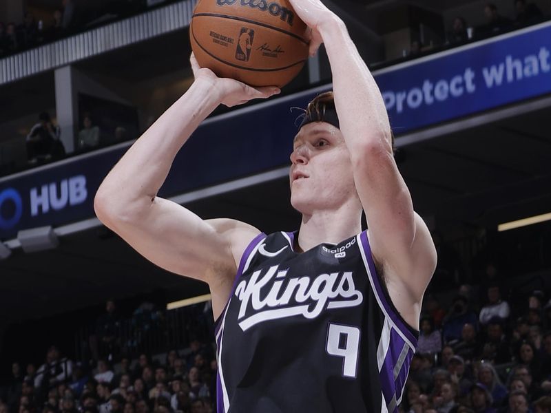 SACRAMENTO, CA - FEBRUARY 7: Kevin Huerter #9 of the Sacramento Kings shoots a three point basket during the game against the Detroit Pistons on February 7, 2024 at Golden 1 Center in Sacramento, California. NOTE TO USER: User expressly acknowledges and agrees that, by downloading and or using this Photograph, user is consenting to the terms and conditions of the Getty Images License Agreement. Mandatory Copyright Notice: Copyright 2024 NBAE (Photo by Rocky Widner/NBAE via Getty Images)