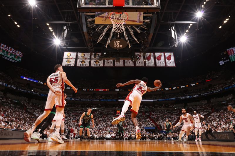 MIAMI, FL - APRIL 27: Haywood Highsmith #24 of the Miami Heat grabs the rebound during the game against the Boston Celtics during Round 1 Game 3 of the 2024 NBA Playoffs on April 27, 2024 at Kaseya Center in Miami, Florida. NOTE TO USER: User expressly acknowledges and agrees that, by downloading and or using this Photograph, user is consenting to the terms and conditions of the Getty Images License Agreement. Mandatory Copyright Notice: Copyright 2024 NBAE (Photo by Issac Baldizon/NBAE via Getty Images)