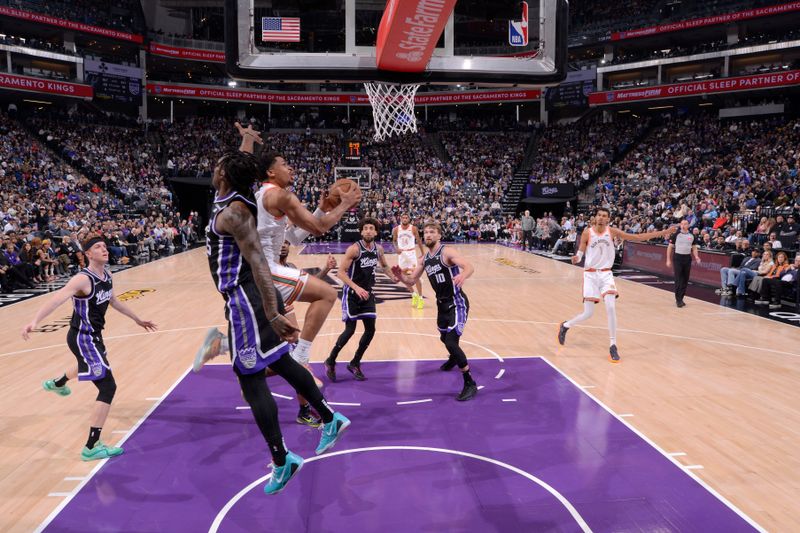 SACRAMENTO, CA - FEBRUARY 22: Keldon Johnson #3 of the San Antonio Spurs drives to the basket during the game against the Sacramento Kings on February 22, 2024 at Golden 1 Center in Sacramento, California. NOTE TO USER: User expressly acknowledges and agrees that, by downloading and or using this Photograph, user is consenting to the terms and conditions of the Getty Images License Agreement. Mandatory Copyright Notice: Copyright 2023 NBAE (Photo by Rocky Widner/NBAE via Getty Images)