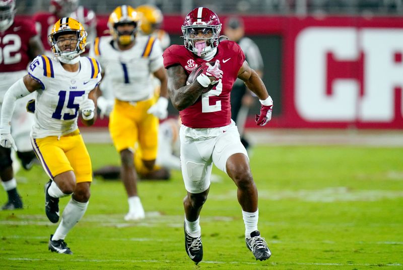 Nov 4, 2023; Tuscaloosa, Alabama, USA; Alabama Crimson Tide running back Jase McClellan (2) runs for yardage against the LSU Tigers during the second quarter at Bryant-Denny Stadium. Mandatory Credit: John David Mercer-USA TODAY Sports