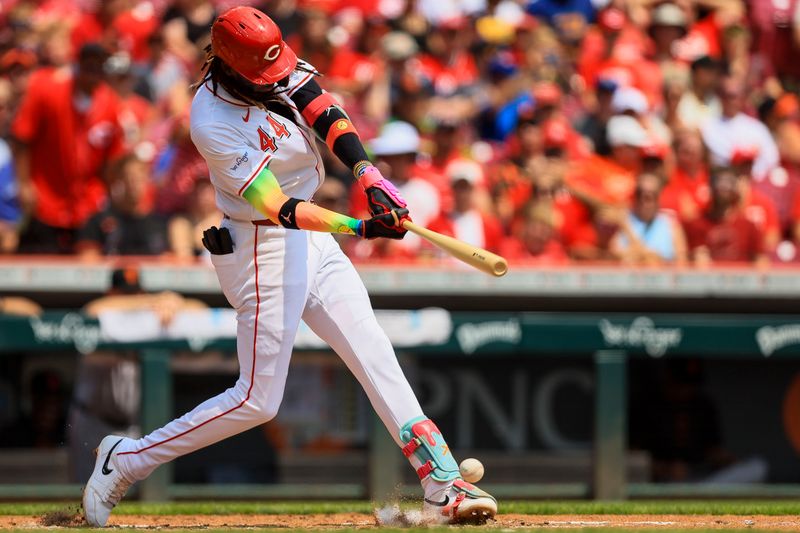 Aug 4, 2024; Cincinnati, Ohio, USA; Cincinnati Reds shortstop Elly De La Cruz (44) hits a single in the third inning against the San Francisco Giants at Great American Ball Park. Mandatory Credit: Katie Stratman-USA TODAY Sports