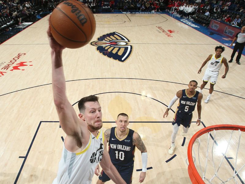 NEW ORLEANS, LA - JANUARY 17:  Drew Eubanks #15 of the Utah Jazz drives to the basket during the game against the New Orleans Pelicans on January 17, 2025 at the Smoothie King Center in New Orleans, Louisiana. NOTE TO USER: User expressly acknowledges and agrees that, by downloading and or using this Photograph, user is consenting to the terms and conditions of the Getty Images License Agreement. Mandatory Copyright Notice: Copyright 2025 NBAE (Photo by Layne Murdoch Jr./NBAE via Getty Images)