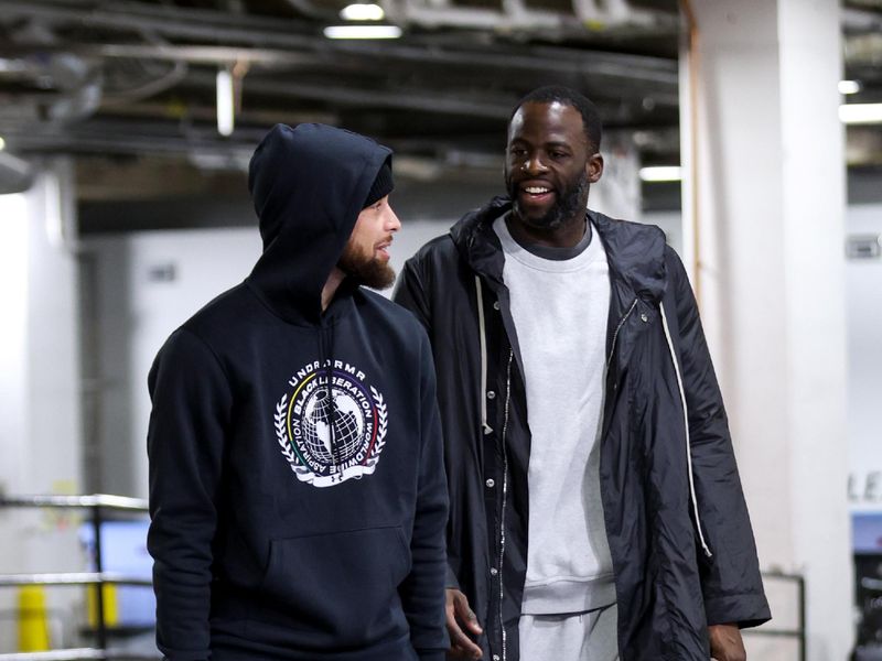 INDIANAPOLIS, IN - FEBRUARY 8: Stephen Curry #30 of the Golden State Warriors and Draymond Green #23 of the Golden State Warriors arrive to the arena before the game against the Indiana Pacers on February 8, 2024 at Gainbridge Fieldhouse in Indianapolis, Indiana. NOTE TO USER: User expressly acknowledges and agrees that, by downloading and or using this Photograph, user is consenting to the terms and conditions of the Getty Images License Agreement. Mandatory Copyright Notice: Copyright 2024 NBAE (Photo by Pepper Robinson/NBAE via Getty Images)