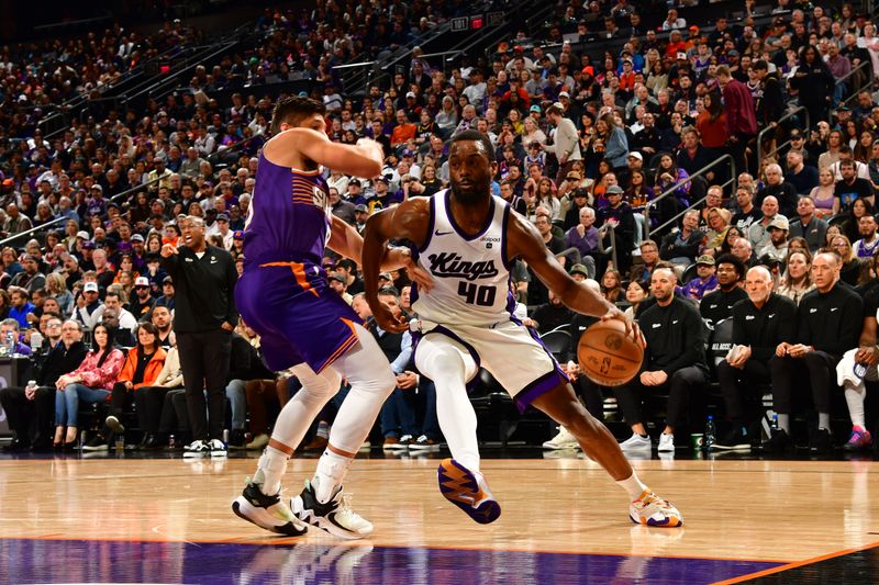 PHOENIX, AZ - FEBRUARY 13:  Harrison Barnes #40 of the Sacramento Kings handles the ball during the game against the Phoenix Suns on February 13, 2024 at Footprint Center in Phoenix, Arizona. NOTE TO USER: User expressly acknowledges and agrees that, by downloading and or using this photograph, user is consenting to the terms and conditions of the Getty Images License Agreement. Mandatory Copyright Notice: Copyright 2024 NBAE (Photo by Kate Frese/NBAE via Getty Images)