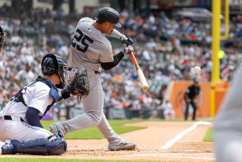 Aug 17, 2024; Detroit, Michigan, USA; New York Yankees second base Gleyber Torres (25) swings and makes contact in the first inning against the Detroit Tigers at Comerica Park. Mandatory Credit: David Reginek-USA TODAY Sports